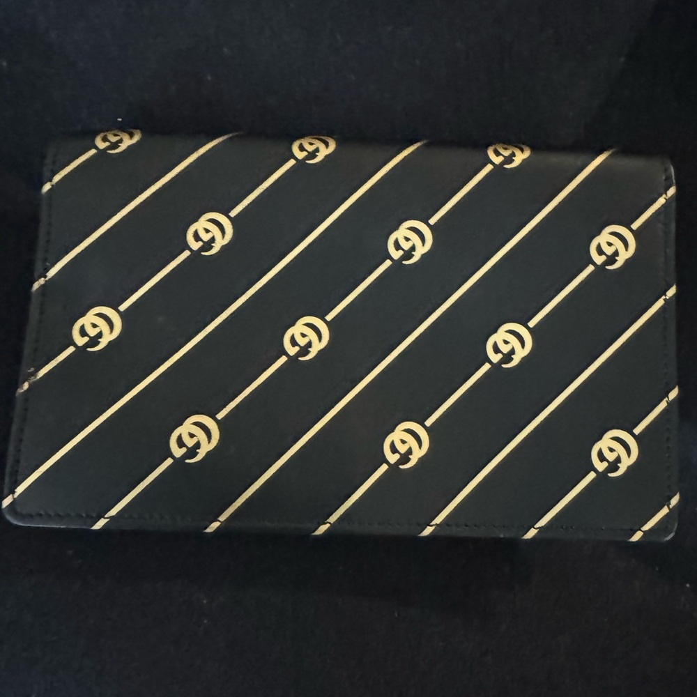 Gucci monogram wallet crossbody bag. Black and gold with mirror inside